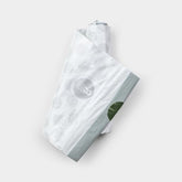 Trash Bag - 36 Liter White trash liners made from plastic.